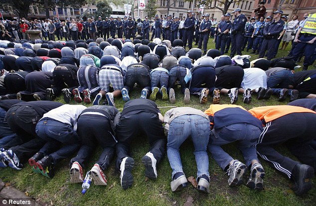 Muslims stage a mass fart - in against gay teacher